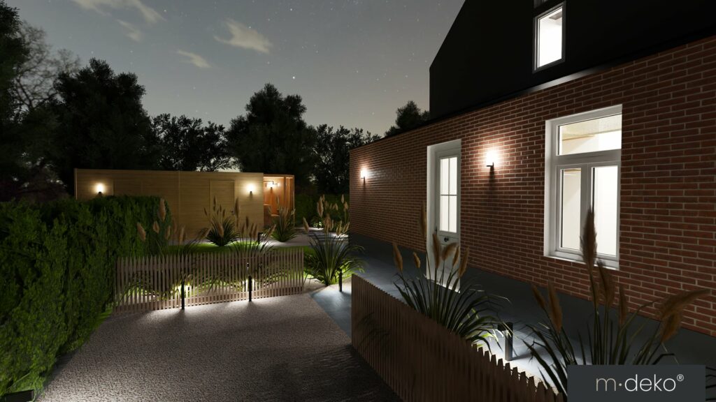 Façade en brique et terrasse avec éclairage paysager, jardin