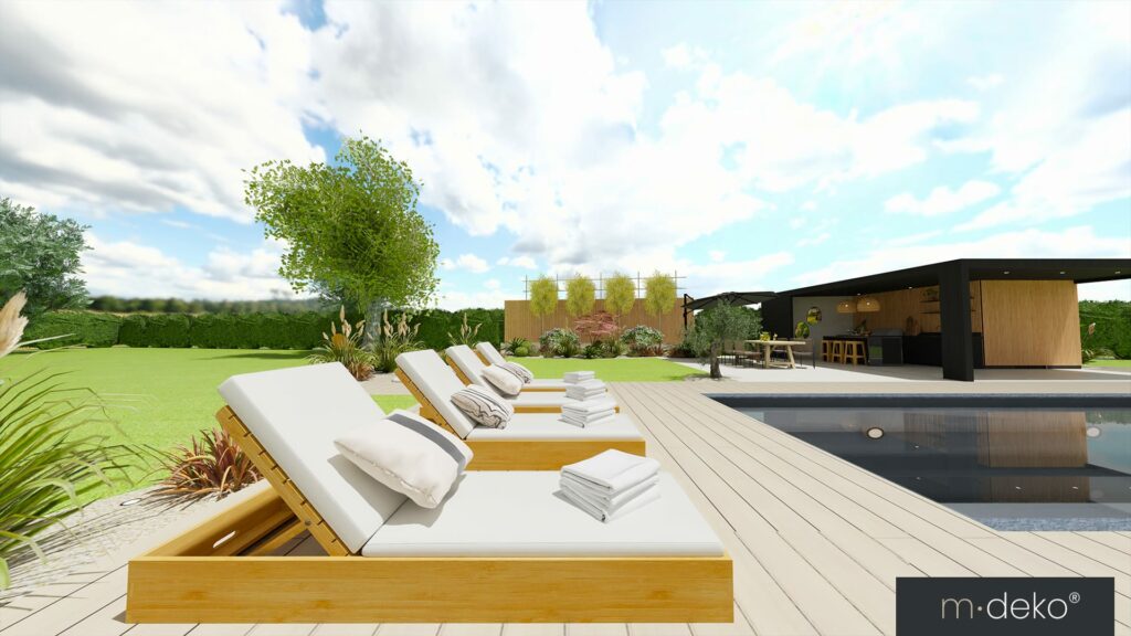 Terrasse avec bains de soleil face à la piscine et au pool house