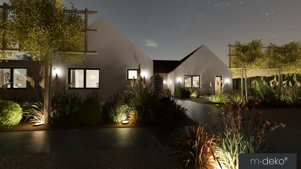 Jardin paysager la nuit avec éclairage au sol et façade moderne en pierre, allée et terrasse extérieure