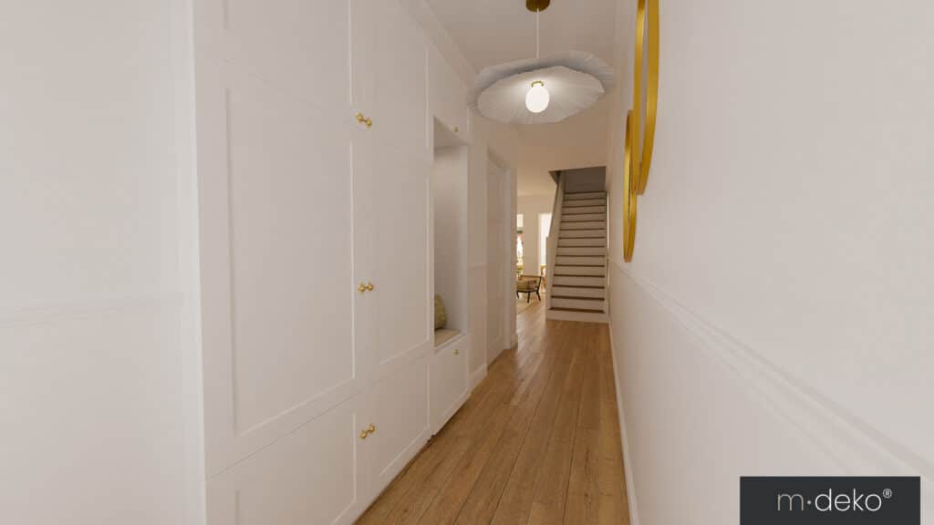Couloir lumineux avec boiseries blanches, moulures dorées et plafond style déco, aménagement intérieur élégant