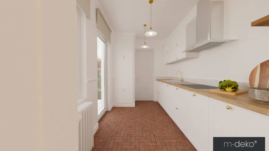 Cuisine blanche avec plan de travail en bois et crédence, vue sur l’espace lumineux et carrelage brun.